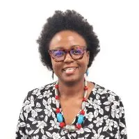 Headshot of Trustee, Kendi M'Marete, on a plain white background.